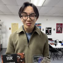 A CardHouse customer with his cards and Secret Lair collection